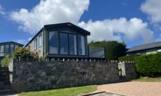 A stunning 2019 Carnaby Helmsley Lodge enjoys extensive views over the River Conwy