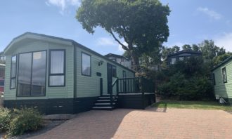 A Pre-Owned Willerby Winchester situated on an elevated plot here at Gorse Hill, Conwy.